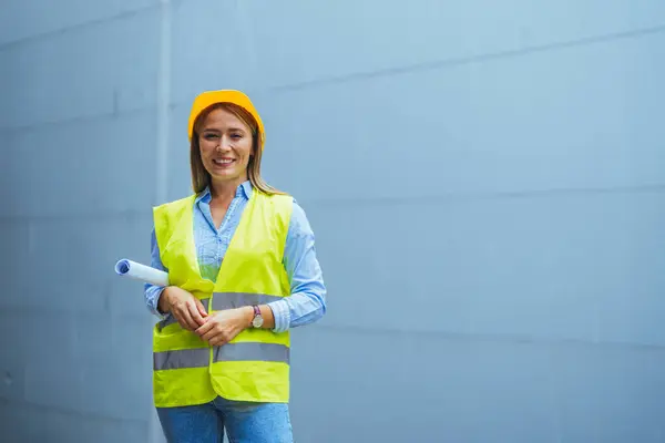 female engineer in safety vest