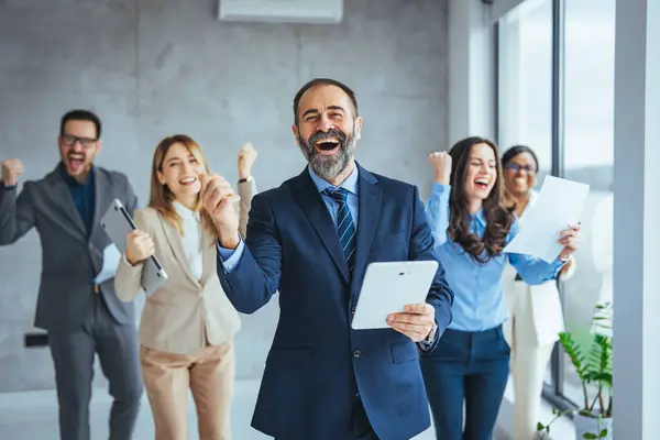 Successful Business Group Celebrating Achievement Office Arms Looking Camera Smiling — Stock Photo, Image