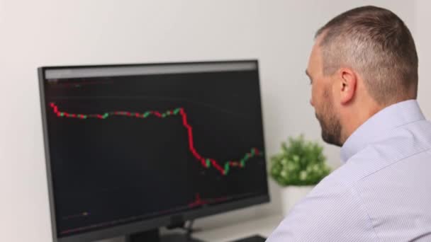Frustrated Tired Stock Trader Looks Value Falling Monitor Screen Bitcoins — Stock Video