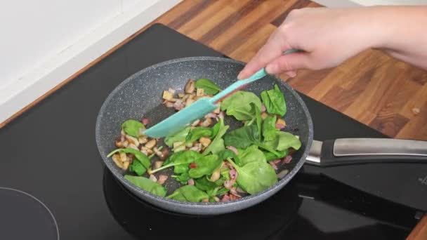 Female Hands Fry Mushrooms Bacon Spinach Frying Pan — Stock Video