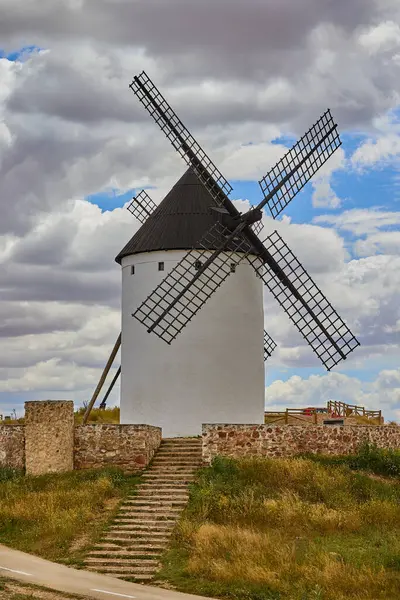 stock image Old windmill in top of the hill in Spain. Land of the Giants and Don Quixote stories.