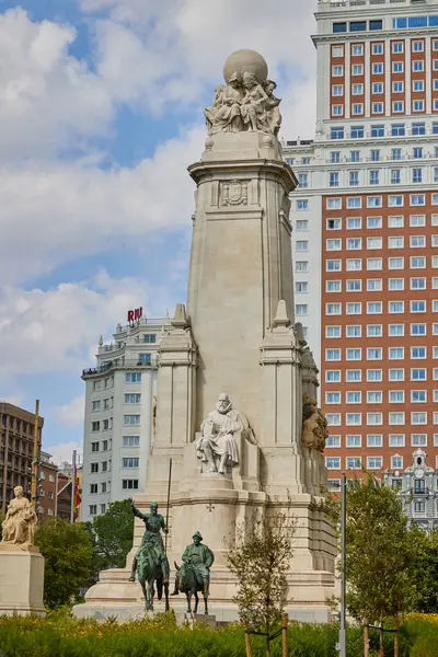 stock image The monument of Miguel Cervantes on Plaza de Espana. Madrid, Spain - June 12, 2024.