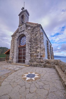 Chapel of San Juan de Gaztelugatxe hermitage in the Basque Country, Spain. clipart