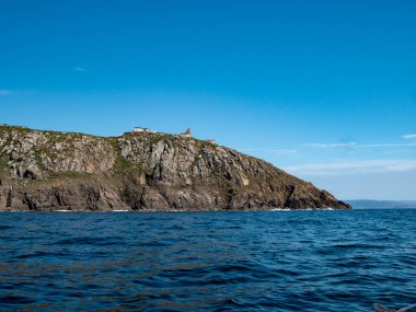 The Finisterre lighthouse in Galicia in Spain clipart