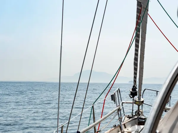 African mountains seen from a sailboat sailing eastwards through the straits of Gibraltar. 