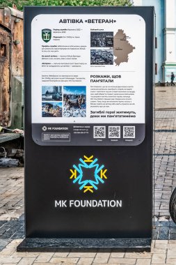 Kyiv, Ukraine - October 27, 2023: Sign at Mykhailivska Square in Kyiv, highlighting the story of a vehicle named 