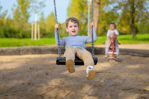 Boy Swing Girl Background Children Playground — Stock Photo, Image
