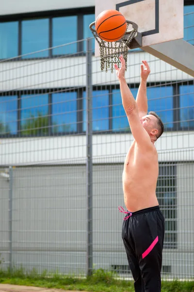 Middle Age Shirtless Man Black Sports Shorts Throws Baskets While — Stock Photo, Image