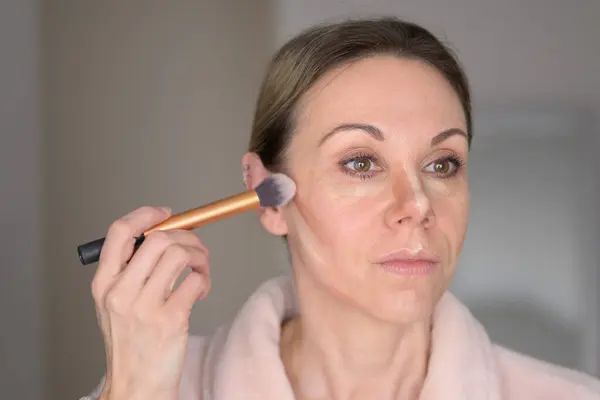 Close Blonde Woman Applying Makeup Brush Home Stock Image