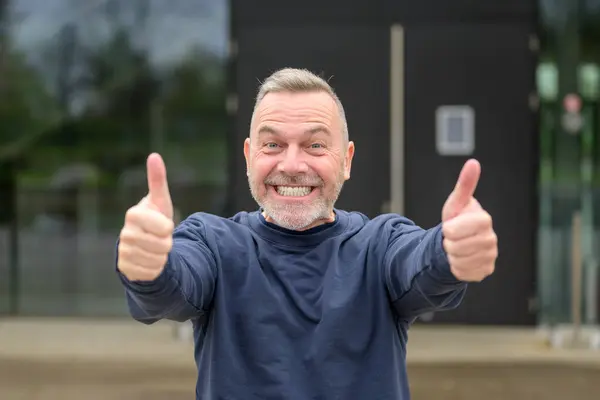Enthusiastic Motivated Attractive Middle Aged Man Giving Double Thumbs Gesture Royalty Free Stock Images