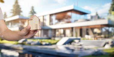 Ev modelleri tutan insanlar, satın alma, satma, ev kiralama, ev ödemeleri..