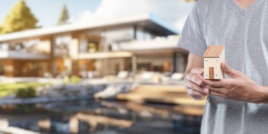 Ev modelleri tutan insanlar, satın alma, satma, ev kiralama, ev ödemeleri..