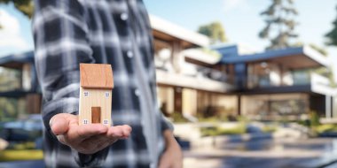 Kiralama piyasasında konut satın alma ve satma kavramını araştırın. Minyatür bir evin ayrıntılı görünümü mülkiyet ve yatırımları gösterir.