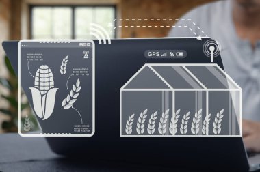 Yenilikçi tarım teknolojisi GPS izleme ve ürün izleme araçlarına sahiptir. Bu resim modern tarım uygulamalarında dijital çözümlerin entegrasyonunu gösteriyor.