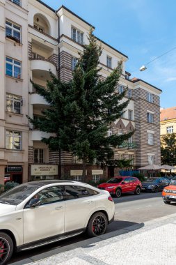 Realization of architect Jaroslav Vondrak in Prague - Dejvice. An apartment building with a striking geometric facade. clipart