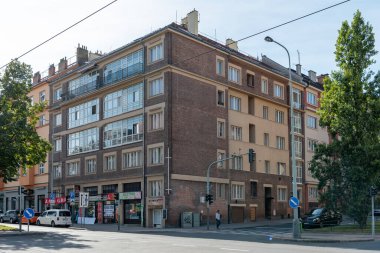 Realization of architect Jaroslav Vondrak in Prague - Dejvice. An apartment building with ashlar motifs and large verandas, designed in the late 1920s clipart