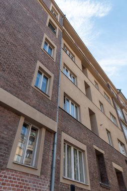 Realization of architect Jaroslav Vondrak in Prague - Dejvice. An apartment building with ashlar motifs and large verandas, designed in the late 1920s clipart