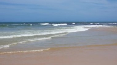 Beautiful sunny day at a Brazilian beach, the Nativos beach of Trancoso, Porto Seguro district - Bahia. Tourist destination of the brazilian northeast.