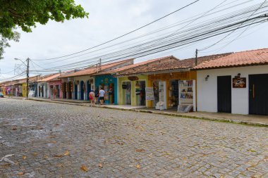 Arraial d'Ajuda, district of Porto Seguro, BA, Brazil - January 04, 2023: local businesses that sell handicrafts and souvenirs to tourists in the Historic Center of Arraial d'Ajuda.