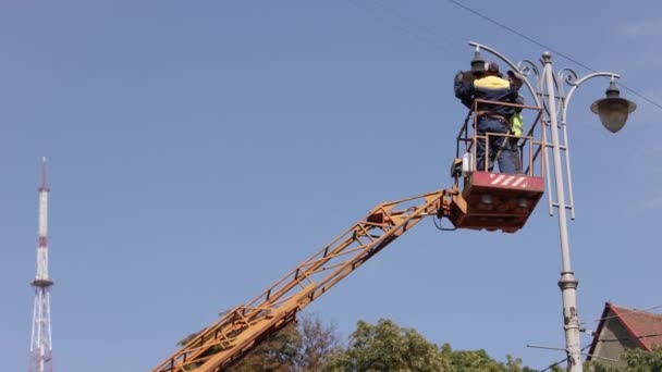 Crane Lifted Diode Lights Repair Works Equipment Installs Street Light — Stock Video