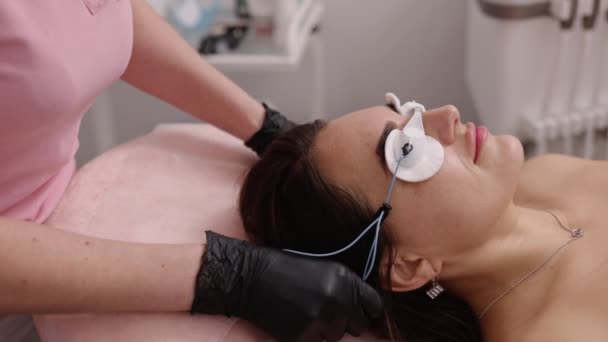 Carbon Laser Peeling Putting Protective Glasses Woman Undergoing Medical Procedure — Vídeos de Stock