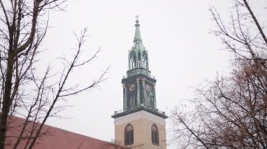 Marienkirche, St. Marys Church, parish church in Berlin. St Marys Church Marienkirche, XV century, located on Karl Liebknecht Street Karl-Liebknecht-Strasse near Alexanderplatz, Berlin, Germany.
