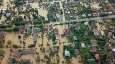 flood in city, aerial drone, flooded road. House with water, flooded by heavy rain, street after heavy rain, Disaster Insurance Claim, severe weather concept, impact of climate change, heavy rainfall