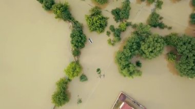 Roads flooded, Huge flood, historic floods. Flood damaged house in street of city, street heavy rain, disaster insurance claim themed, severe weather concept, impact of climate change, heavy rain