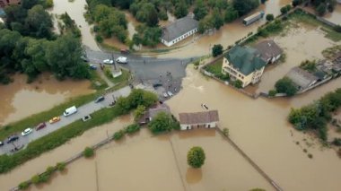 flooding, flood flowed, homes totally destroyed. Flood affected house on streets of city, after heavy rain, on street just after flood, disaster insurance claim themed, severe weather concept