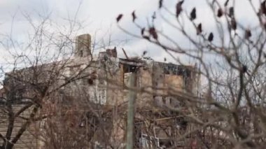 Buildings destroyed, remnants of brick, ruins of house. War-damaged building, part of scene of collapse of building in Ukraine, debris, dust, damaged house were left behind as consequence of bombing