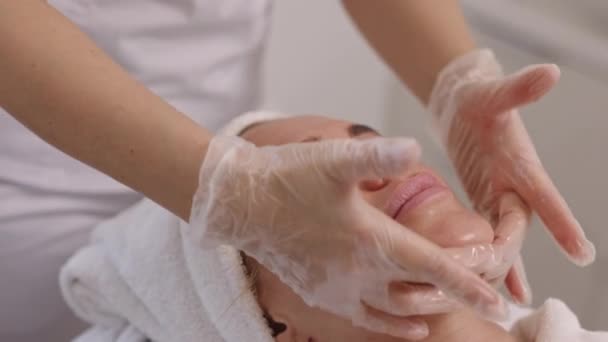 Skin Care Receiving Massage Womans Face Young Woman Getting Facelift — Stock Video