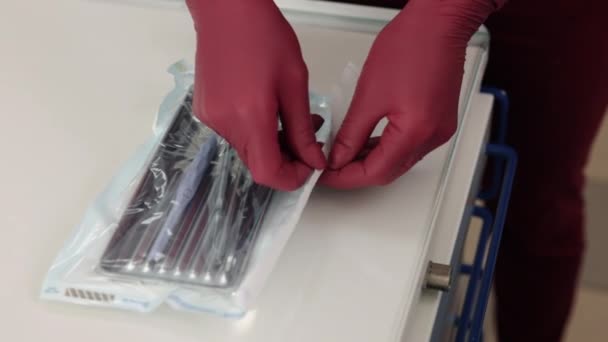 Sterile Instruments Dentist Hygiene Sterilization Process Close Dentists Hands Methodically — Video Stock