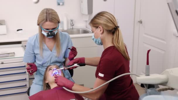 Dental Clinic Teeth Treatment Teeth Therapy Stomatologist Employs Ultraviolet Light — Video