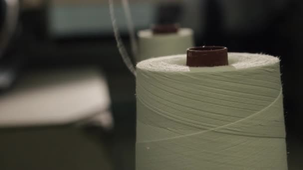 White Thread Sharp Thread Fabric Focus Two Reels White Thread — Stock Video