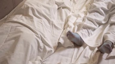 Dead mans foot covered with a sheet. Many victims of coronavirus infected person death around the world, severe epidemic that leads to enormous loss during coronavirus outbreak.