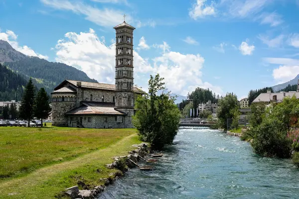 stock image St. Karl Borromaus next to the Inn river in St. Moritz in summer. Engadine, Grisons, Switzerland