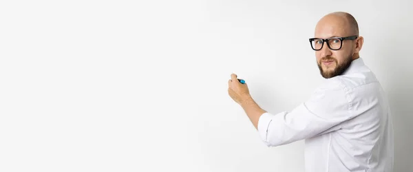 Young Man Writing Marker Blackboard White Background Banner — Stock Photo, Image