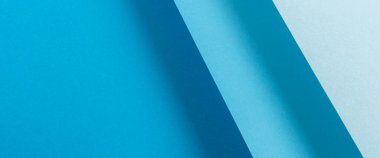 Renkli mavi katlanmış kağıt malzeme tasarımı. Üst manzara, düz yatış. Pankart. 