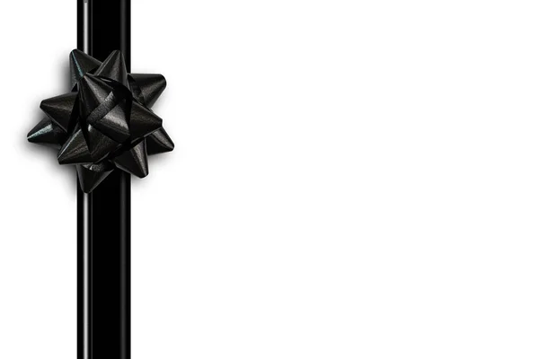 孤立した白い背景にギフトの弓と黒のリボン トップビュー フラットレイアウト — ストック写真