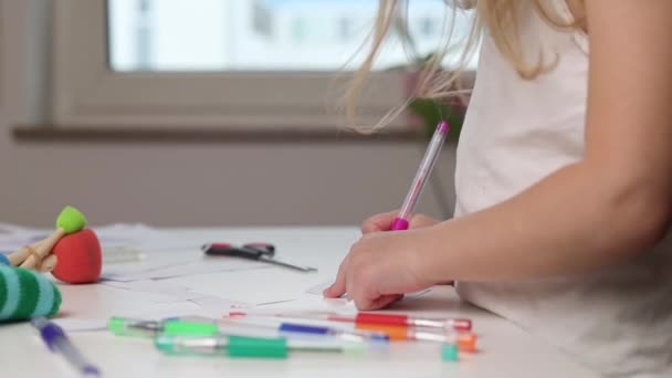 Child Girl Draws Pen While Standing Table — Stock Video