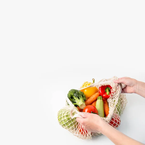 Female Hands Take Out Fresh Vegetables Bag White Background Top Stok Fotoğraf