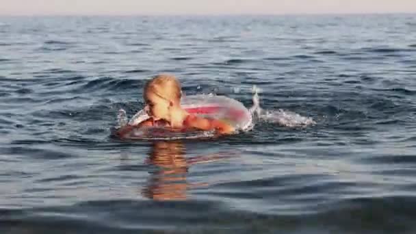 Little Girl Swims Inflatable Ring Sea — Stock Video