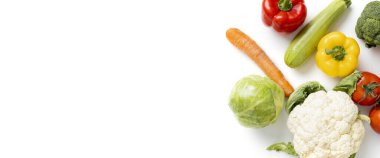Fresh vegetables on a light background. Top view, flat lay. Banner.