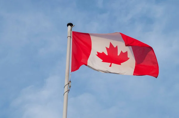stock image flag state canada north america flying against the sky