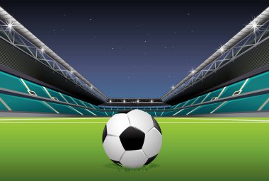 Gece yarısı boş bir futbol stadyumuna yakın çekim.