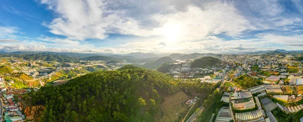 360 Panorama of Breathtaking Mountain Skyline in Da Lat City, Vietnam: A Stunning View of Cityscape and Majestic Mountains under the Blue Sky