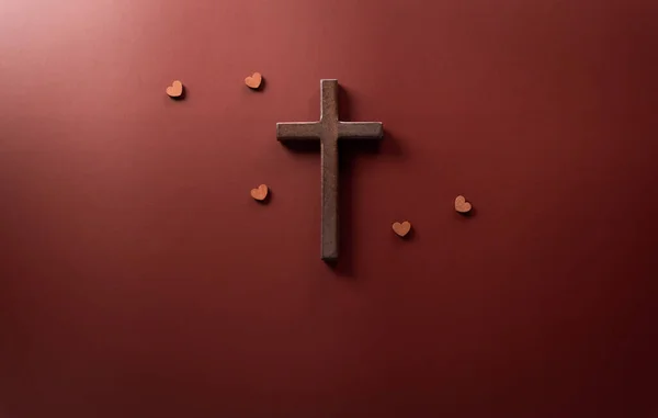 Good Friday and Holy week concept - A religious cross on dark background.