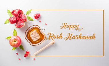 Rosh hashanah (Yahudi Yeni Yıl Tatili), Pastel arkaplan üzerine yazılı geleneksel veya dini semboller kavramı.