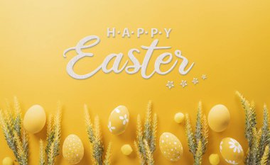 Happy easter! Colourful Easter eggs on yellow background. Decoration concept for greetings and presents on Easter Day celebrate time.