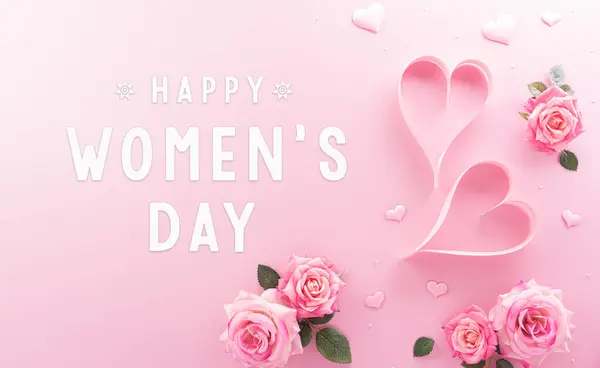 バレンタインと女性の日のコンセプトは パステル背景にピンクの紙の心から作られました ストック画像